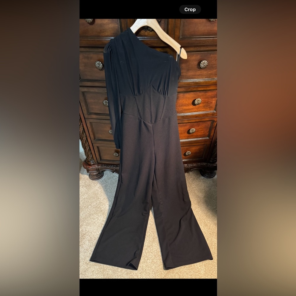 Black Jumpsuit. Dressy. Small. Off one shoulder. Sheer sleeve & upper bodice.